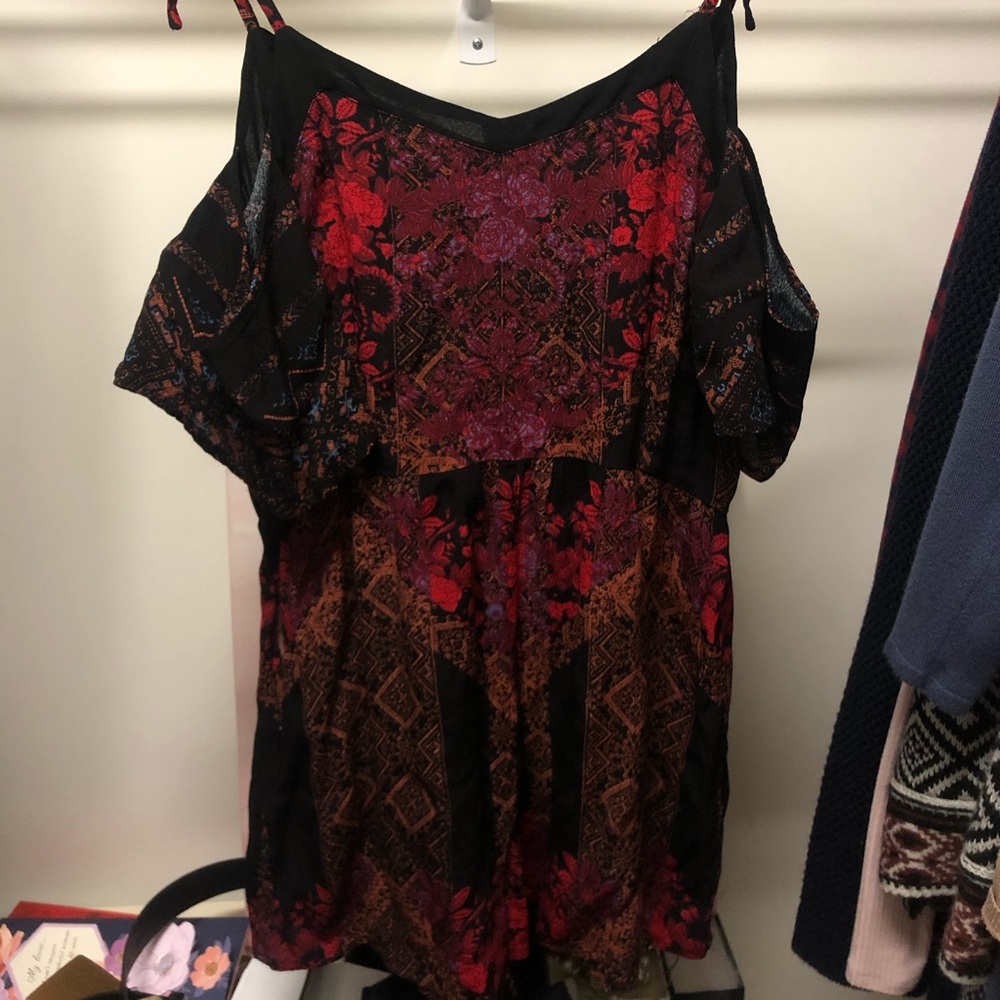 Beautiful dark colored romper!